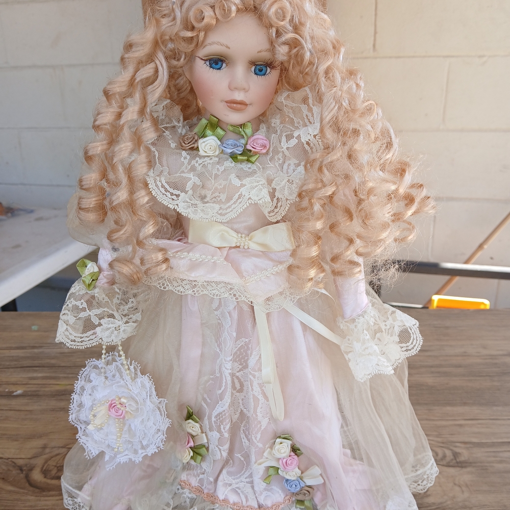 Elegant Porcelain Doll with Blonde Curls